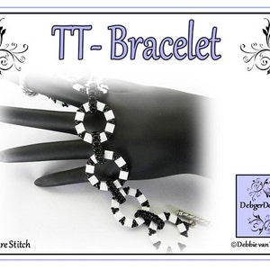 May include: Black and white beaded bracelet with a square stitch pattern. The bracelet is made of small, round beads and features a series of connected circles. The bracelet is shown on a hand model and has a clasp closure.  TT-Bracelet. DebbiegerDesigns. ©Debbie van Tonder.