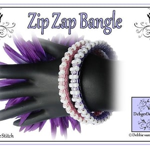 May include: Three beaded bracelets in shades of purple, pink, and white, stacked on a hand wearing a purple flower accessory. The bracelets are made with peyote stitch and the text "Zip Zap Bangle" is displayed above the bracelets.