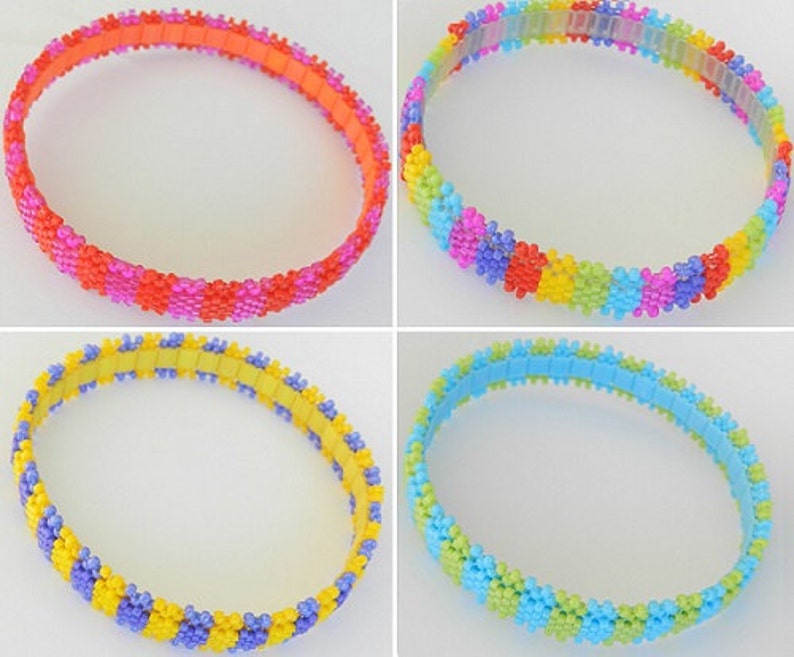 May include: Four colorful beaded bracelets with different color combinations. The bracelets are made of small, round beads in shades of pink, orange, yellow, green, blue, and purple.