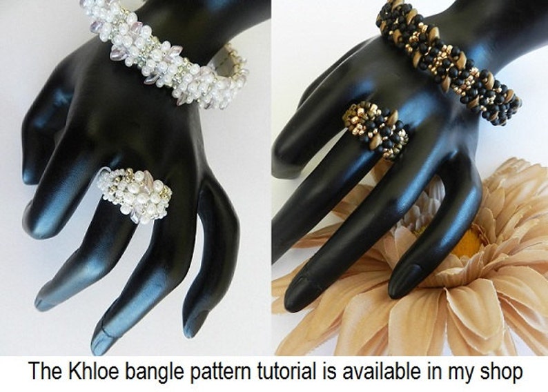 May include: Two beaded bracelets and rings. One bracelet is white and silver with a ring of the same colour. The other bracelet is black and gold with a ring of the same colour.