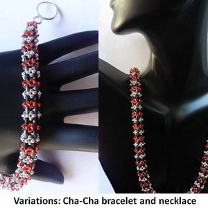 May include: A red and silver beaded bracelet and necklace. The bracelet has a silver clasp. The necklace is worn by a mannequin.