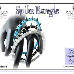 May include: Three beaded bracelets with a spike design. The bracelets are blue, black, and white. The bracelets are on a black hand model. The image text reads "Spike Bangle" and "Square Stitch".