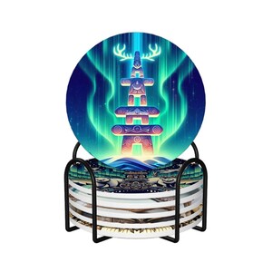 May include: A set of round coasters with a black metal holder. Each coaster features a vibrant design of a totem-like figure with antlers against a backdrop of aurora borealis in shades of blue, green, and purple. The coasters are stacked neatly in the holder.