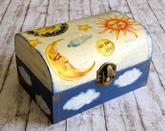 Wooden jewelry box with sun and moon decoupage and hand painted clouds in blue and cream
