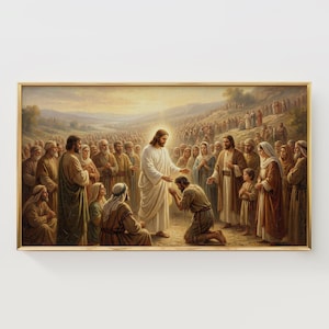May include: A framed painting depicts a biblical scene with a central figure in white robes extending a hand towards a kneeling man. Surrounding them are numerous figures in various robes, set against a backdrop of a crowd and rolling hills. The artwork is framed in gold.