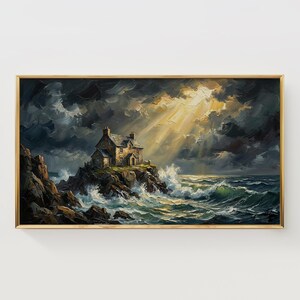 May include: Oil painting of a stone house on a rocky cliff, framed in gold. The house is lit by sunlight breaking through a stormy sky over a turbulent sea. The artwork evokes a sense of drama and isolation.