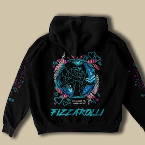 May include: Black hoodie with a graphic design on the back featuring a cartoon character in a blue and pink circular frame. The text "FIZZAROLLI" is in teal, with additional text and heart shapes. Sleeves have colorful patterns.