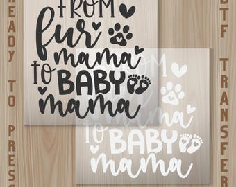 May include: Two DTF transfer sheets with the text "FROM fur mama TO BABY mama" in black and white. The design includes paw prints, hearts, and baby footprints. The words "READY TO PRESS" are on the left side.