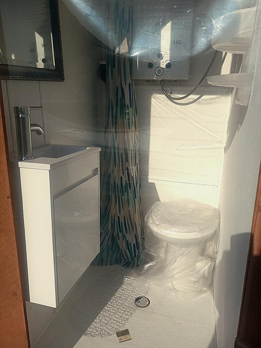 Image showcasing 7 inspiring Bathroom Design Ideas for Off Grid Cabins