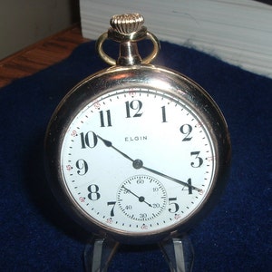 Gentlemen&#39;s Elgin 12 Size 7 Jewels Gilded Movement Pocket Watch