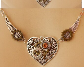 Red Crystal Heart & Wings Pendant Burn Gold Tone Necklace Costume Jewellery SALE Red Crystal Heart & Wings Pendant Burn Gold Tone Necklace Costume Jewellery SALE