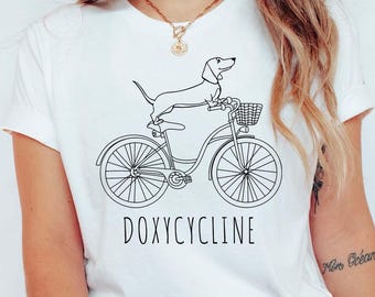 Dachshund on Bicycle T-Shirt, Pharmacy Pun Gift