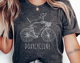 Doxycycline Pharmacy Pun T-Shirt, Dachshund on Bicycle, Pharmacist Gift
