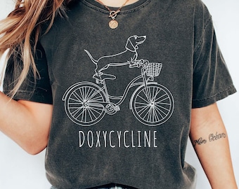 Dachshund on Bicycle T-Shirt, Pharmacy Pun Gift