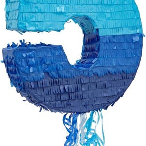 May include: Blue and white number five shaped pinata with blue and white streamers hanging from the bottom.