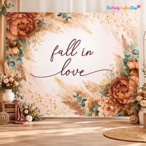 May include: A rectangular backdrop featuring the text fall in love in dark maroon script. The design includes watercolor illustrations of large burnt orange peonies, dried pampas grass, and eucalyptus leaves with gold speckles on a cream background.