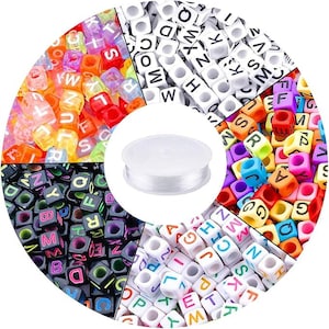 May include: Assortment of colorful letter beads in various colors, including black, white, red, blue, green, yellow, and orange. The beads are arranged in a circle around a spool of clear elastic string.