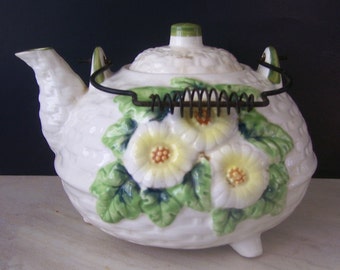 Vintage Porcelain Footed Teapot with Wire Bail Handle, Marked on The Bottom Japan, Quilted Exterior with Embossed Flowers/ Very Pretty