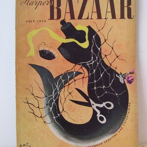 May include: A vintage magazine cover for Harper's Bazaar, July 1938, featuring an abstract illustration of a fish with a yellow ribbon and scissors. The text "MIDSUMMER FASHIONS AND ENTERTAINING" is printed on the cover.