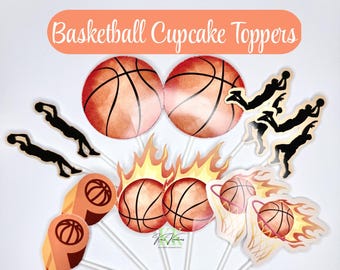 May include: Basketball cupcake toppers in various designs. The toppers include basketballs, basketball players, and basketballs with flames. The text "Basketball Cupcake Toppers" is displayed in an orange banner. The toppers are on white sticks.