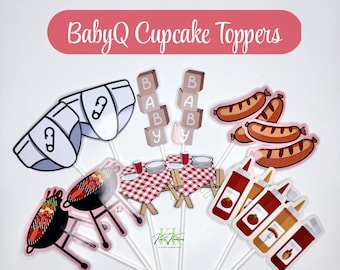 May include: A collection of BabyQ cupcake toppers featuring diaper, sausage, grill, and condiment designs. The toppers include the text "BabyQ Cupcake Toppers" in a pink banner. The toppers are on white sticks.