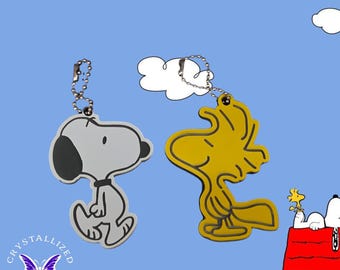 Llavero de doble cara de Snoopy y Woodstock