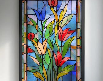Könnte beinhalten: Buntglasfenster mit einem Blumendesign aus roten, gelben und blauen Tulpen. Das Kunstwerk ist schwarz gerahmt und vor einem hellblauen Hintergrund platziert. Die Glaskunst ist an einer weißen Wand montiert.