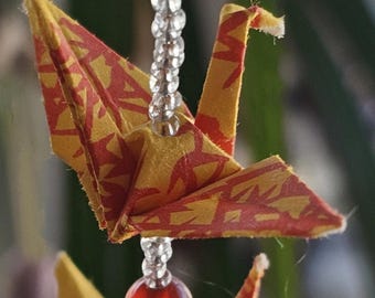 Origami kraanvogelornament Sunset Ember met kwastje | Rood geel papier kraan hangend decor