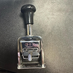 May include: A set of three ceramic mugs with a speckled, matte finish. The mugs are in shades of cream, light gray, and dark gray. Each mug has a simple, minimalist design, perfect for coffee or tea.