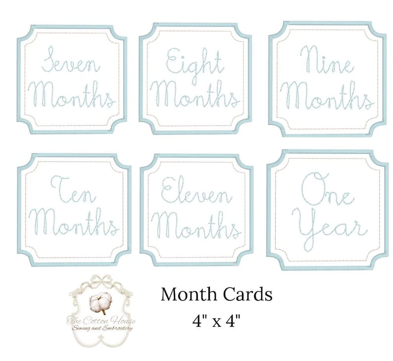May include: Set of six baby month cards with a light blue border and text. The cards read "Seven Months", "Eight Months", "Nine Months", "Ten Months", "Eleven Months", and "One Year". The cards are 4" x 4".