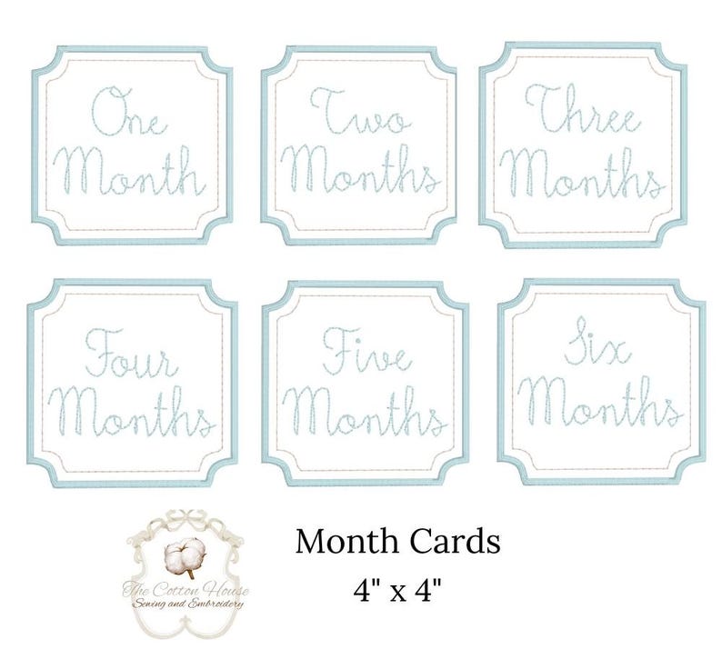 May include: Set of six baby month cards, each 4" x 4", with embroidered text in a light blue frame. The cards read "One Month" through "Six Months". The Cotton House Sewing and Embroidery logo is at the bottom.