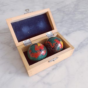 May include: A set of three ceramic mugs with a speckled, matte finish. Each mug features a different color: light blue, cream, and gray. The mugs have a simple, modern design and a comfortable handle. Perfect for coffee or tea.