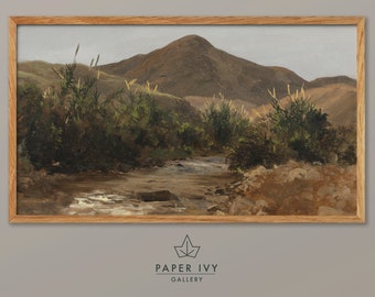 Vintage landscape art for frame TV, oil painting of a stream and a distant mountain, against a pale grey sky.