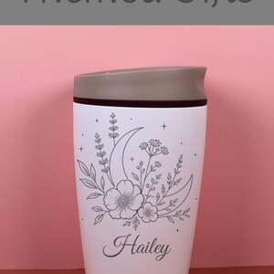 Custom name engraved Owala SmoothSip bottle with moon, celestial, and wildflower artwork. This floral travel coffee cup is both useful and sentimental, offering a unique personalized gift for birthdays, best friends, coffee lovers, or anyone who enjoys magical nature inspired designs.