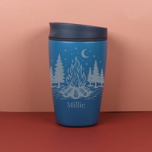 Custom name Owala SmoothSip travel cup with a celestial camping design inspired by moonlit adventures, campfire memories, and star-filled skies. The engraved details create a lasting personalized look for a practical and giftable coffee cup made for outdoor-loving spirits.