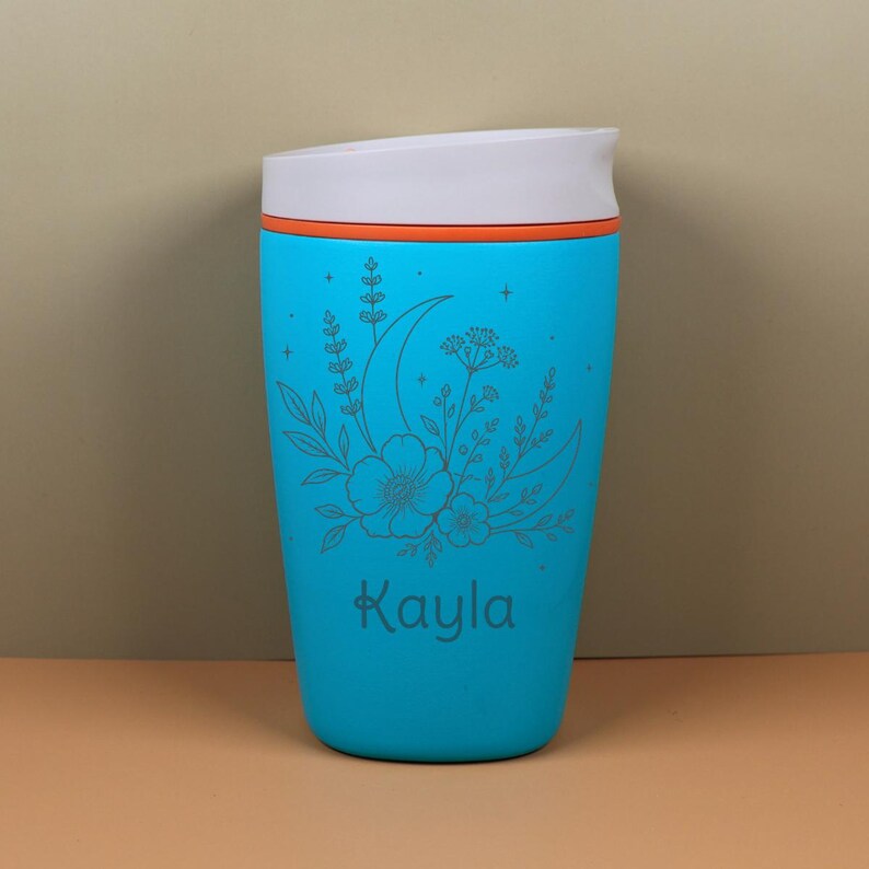 Custom engraved Owala SmoothSip bottle with a dreamy moon and floral wildflower design. The personalized name detail makes this travel coffee cup feel one of a kind, while the celestial artwork adds a whimsical touch for best friends, moms, sisters, coworkers, teachers, or birthday gift recipients.