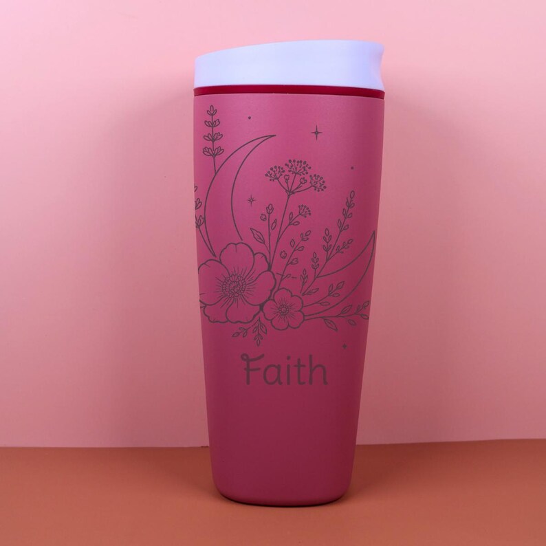 Laser engraved Owala SmoothSip travel bottle featuring a custom name with moon, flower, and celestial inspired details. This personalized coffee cup has a whimsical wildflower look that feels magical and giftable, perfect for birthdays, bridesmaid gifts, friendship gifts, or cozy daily sipping on the go.