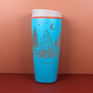 Celestial outdoor-themed Owala SmoothSip cup featuring engraved starry camping details and a personalized custom name. This cozy and whimsical drinkware design makes a thoughtful gift for campers, nature lovers, stargazers, travelers, and anyone who enjoys magical night skies.