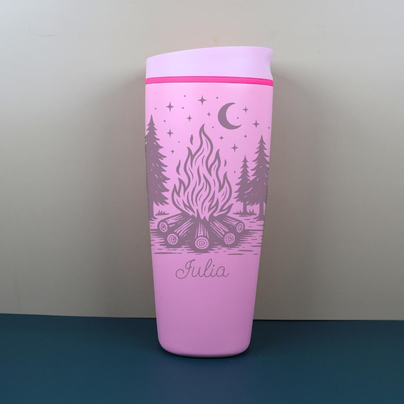 Personalized Owala SmoothSip travel coffee cup featuring a whimsical celestial camping design with stars, moon accents, and cozy outdoor details. This engraved cup includes a custom name, making it a thoughtful gift for campers, stargazers, nature lovers, and anyone who enjoys magical campfire nights.