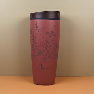 Engraved travel coffee cup on an Owala SmoothSip bottle featuring a custom name with moon, floral, and wildflower artwork. This personalized celestial design is ideal for gifting to a best friend, sister, coworker, or birthday recipient who loves magical details, nature inspired style, and useful drinkware.