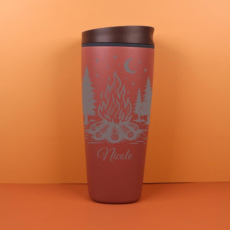 Personalized engraved Owala SmoothSip bottle decorated with a whimsical camping and celestial night sky theme. This custom travel coffee cup is great for sipping coffee, tea, or favorite drinks during morning commutes, camping weekends, cabin stays, or peaceful outdoor escapes.