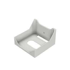 Puede incluir: Un soporte blanco, con base rectangular y abertura curva. El soporte tiene lados angulados y una parte trasera elevada con dos pequeños agujeros. El diseño es simple y funcional.