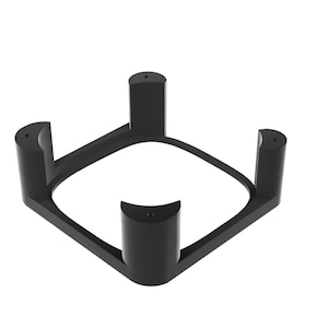 Może przedstawiać: Czarny plastikowy stojak z czterema nogami, zaprojektowany do trzymania okrągłego przedmiotu.