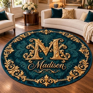 May include: A round area rug featuring a deep teal background with a dark, intricate damask pattern. The center displays a large, ornate gold letter M above the name Madison in gold script, all framed by a decorative gold border.