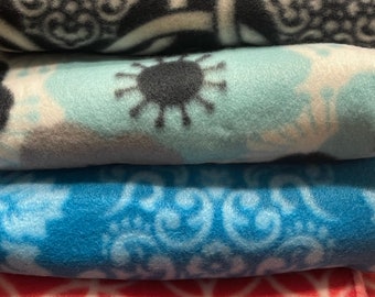 Fleece fabric stash, multiple prints.