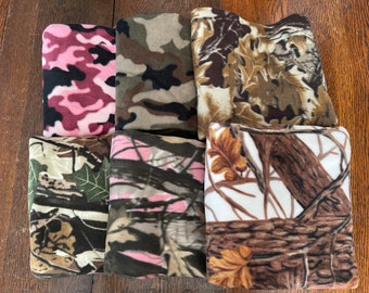 Fleece fabric stash, multiple camouflage prints.