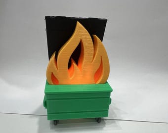 Juguete decorativo de escritorio con forma de contenedor de basura y fuego para el trabajo y la oficina en casa. Bonito juguete iluminado.