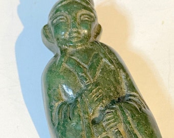 A Jade Hand Carved Girl on a Canadian Jade Necklace