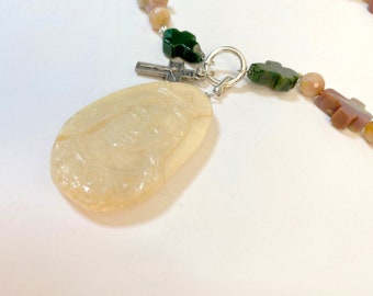 White Jade Carved Mother Mary on a Necklace of Indian Agate Carved Crosses