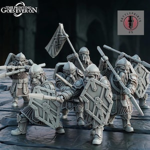 May include: A collection of miniature fantasy figures, possibly for tabletop gaming. The figures are in armour, holding spears, shields, and a flag. The figures have long beards and helmets. The image includes the text "THE PRINTING GOES EVER ON" and "BATTLEPRINTS US".